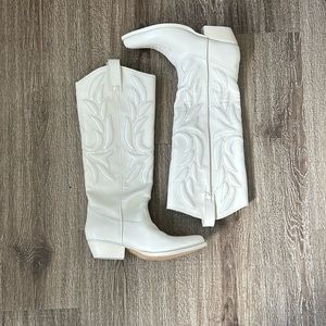 Never worn Guess cowboy boots size 7. 5